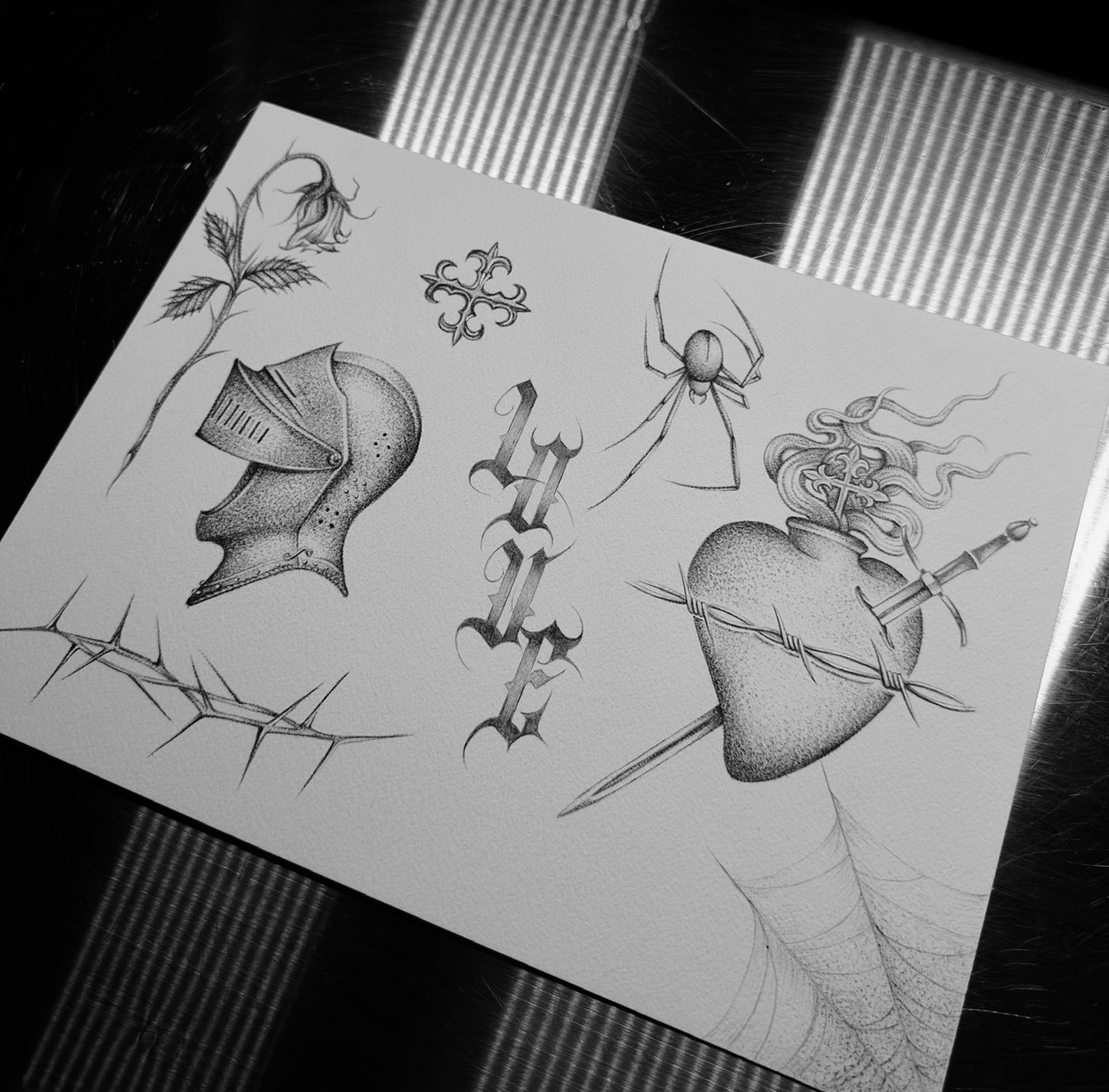 tattoo flash sheet: hearts, spider, thorns