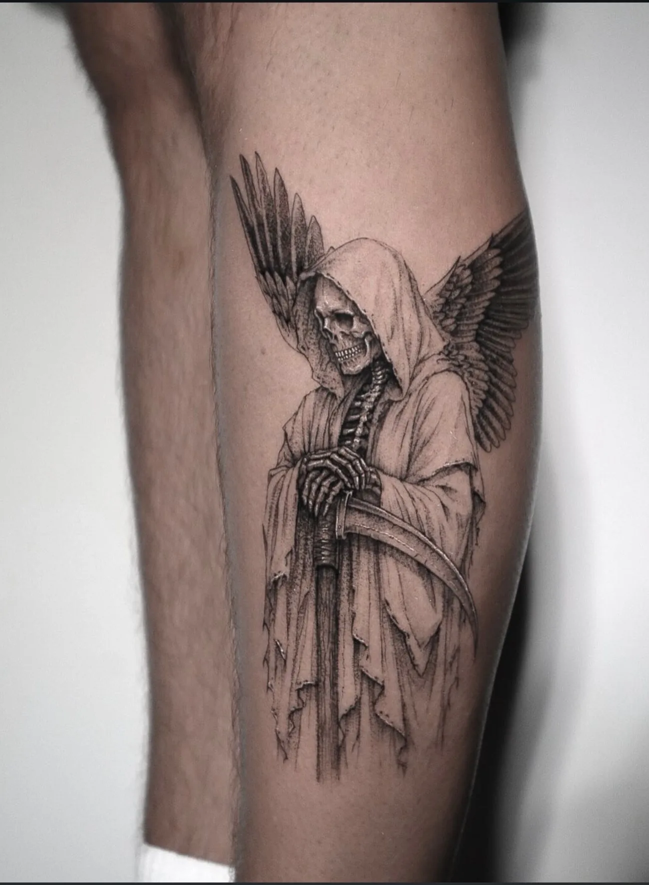 realism tattoo, angel of death on the calf