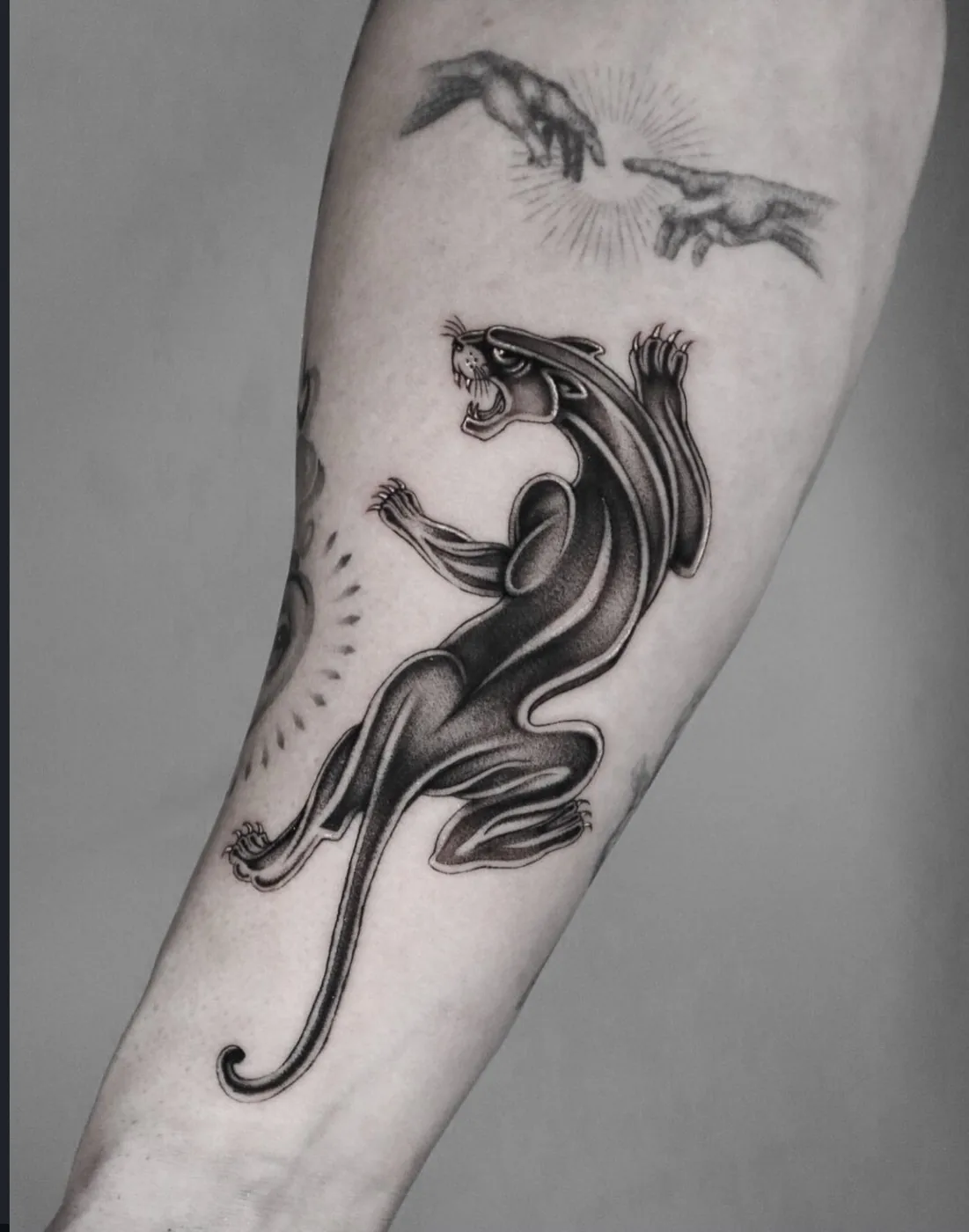 realism tattoo, panther on the forearm