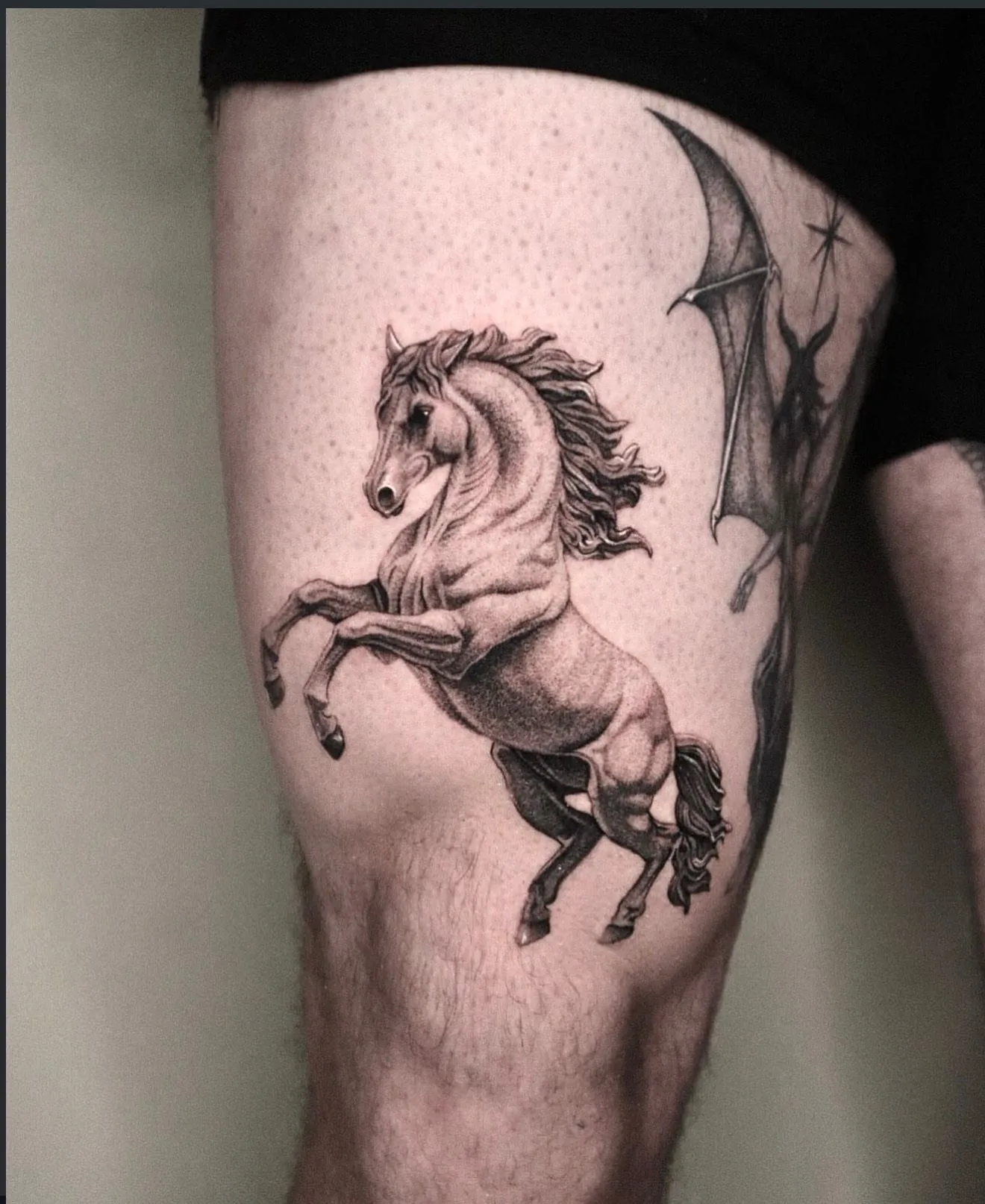 realism tattoo, rearing horse on the thigh