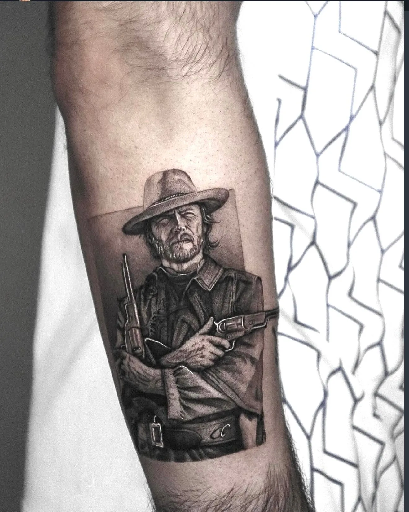 realism tattoo, cowboy portrait on the forearm