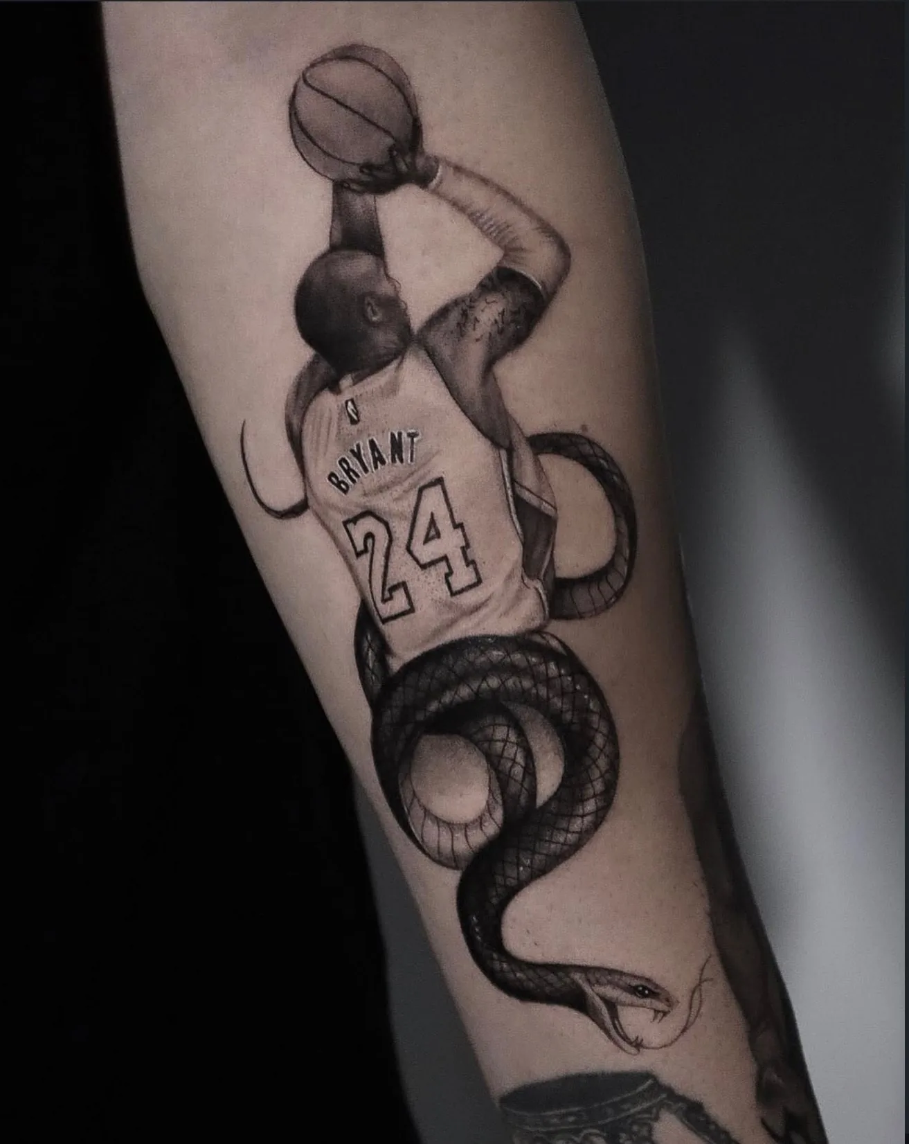 realism tattoo, basketball tribute on the forearm